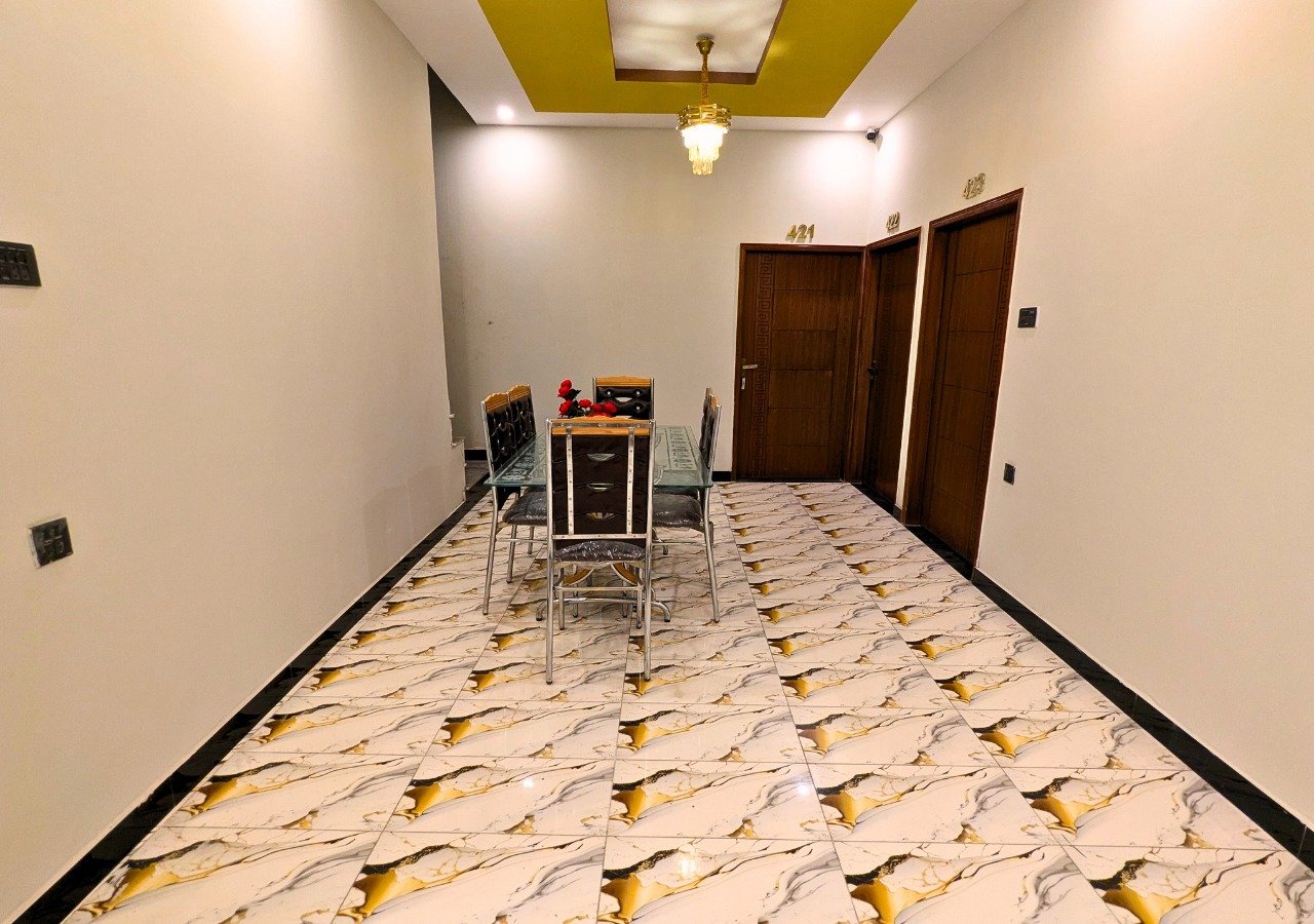 Lobby sitting area at Dove Inn Executive Hotel